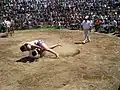 کشتی با چوخه در گود کشتی پهلوان سخدری روستای حاجیآباد زبرخان