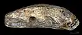 Cave bear canine pierced and engraved with a representation of pike.