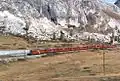 Two motor coaches of RhB in MU pulling the maximum allowed load of 140 t on the Bernina line