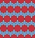 Another compact packing of two sizes of circle