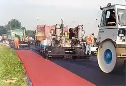Image 37Red surfacing for a bicycle lane in the Netherlands (from Road surface)