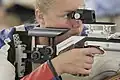 An adjustable aperture system (0.5 to 3.0&nbsp;mm (0.020 to 0.118&nbsp;in)) and occluder mounted on a 10 metre air rifle diopter.