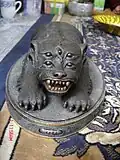 Image of a Sihuhata amulet, Wat Phra That Doi Khao Kwai Kaew, Sitting Position