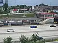 Pedestrian access to 63rd is from the bridge spanning the Dan Ryan expressway. Most stations built in highway medians on the Chicago "L" are reached in this way