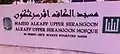 The name of the mosque, address, and Jawi name.