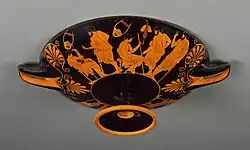 Pederastic courtship scenes.[64] It has been commented that "Hares were popular love gifts in Athenian society...[and] ...a hare can be seen siting tamely on the lap of one of the seated figures."[64] The outside of an Attic cup. Kylix. Artist; Douris. Potter; Attributed to the Python potter. Around 480 BCE. J. Paul Getty Museum