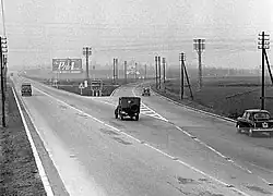 Image 35The Italian Autostrada dei Laghi ("Lakes Motorway" in the 1950s; now parts of the Autostrada A8 and the Autostrada A9), the first controlled-access highway ever built in the world (from History of road transport)