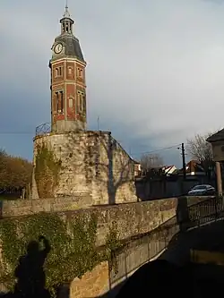 Belfry dating from the 19th century built on a tower dating from 12th century