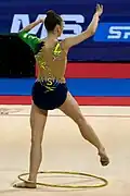 Preparing to throw the hoop using a foot (Boryana Kaleyn)