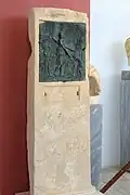 Bronze relief at votive stele Artemis with two satyrs preparing sacrofice, 225-200 BC.