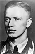 A man wearing a military uniform.