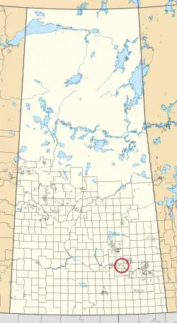 A map of the province of Saskatchewan showing 297 rural municipalities and hundreds of small Indian reserves. One is highlighted with a red circle.