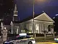Street view at night of the restored cathedral