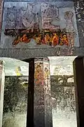 Cave 9: fresco with Buddhas in orange robes and protected by chatra umbrellas