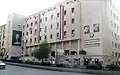 Portrait of Hafez and Bashar on the state building in Damascus.