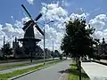 The mill, its dwelling and warehouse along the Phoenixstraat in August 2023.