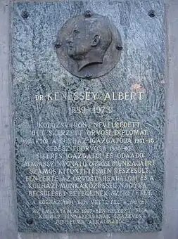 The memorial plaque in recognition of its former Surgeon-in-Chief and Director, Dr. Albert Kenessey, at the main entrance of the hospital in Balassagyarmat, Hungary, which is named after him.
