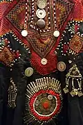 Embroidered dress, view 2, Kohistan, Northwest Frontier Province, Pakistan, early 20th century, cotton, silk, glass, plastic, silver, brass - Fernbank Museum of Natural History - DSC00131