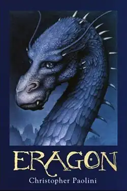Head and neck of a dragon. She has spikes on her scaly curved neck and antler-like projections over her eyes. Also a light teal color.