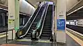 Escalators to concourse from platform level, August 2024