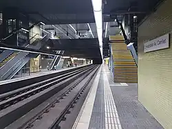 A picture of the Llobregat-Anoia line's platforms, with the old station signage