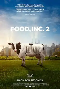 A cow with a large barcode pattern