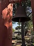 Bell with View of N2theBlue Scuba Diving in the Parking Area