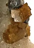 Siderite crystals with galena and quartz. Size: 6.2&nbsp;cm ×&nbsp;4.1&nbsp;cm ×&nbsp;3.6&nbsp;cm (2.4&nbsp;in ×&nbsp;1.6&nbsp;in ×&nbsp;1.4&nbsp;in)