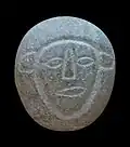 Carthaginian granite pebble with figure of deity. 5th century BCE