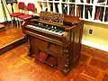 Flattop reed organ:[43][44][45][57] melodeon or American reed organ