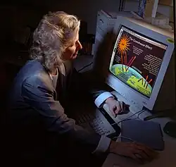 A person's attention set on their computer screen.
