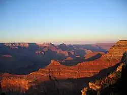 (view east-northeast, from Mather Point-(Yavapai Point)) O'Neill Butte, on ridgeline north, from Newton Butte. Pattie Butte sits on an upper platform of Redwall Limestone, overlain by a 2nd-platform of Surprise Canyon Formation. (partly eroded)