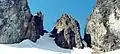 Gunsight Notch, which is lower on the Cache Glacier and should not be mistaken for Cache Col