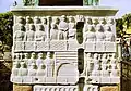 The emperor and his court, bronze and porphyry cubes, gash (north face).