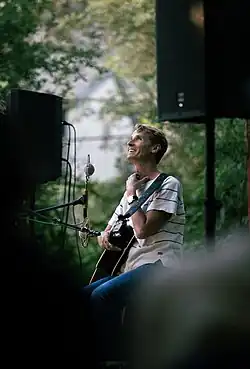 Brosseau at a house concert in Salt Lake City, Utah (2024)