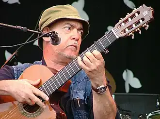 Image 12Ilham Madfai, "The Baghdad Beatle". Madfai's synthesis of Western guitar stylings with traditional Iraqi music has made him a popular performer in his native country and throughout the Middle East. (from Music of Iraq)