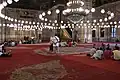 Interior view towards the mihrab niche (left) and the two minbars (center and center left)