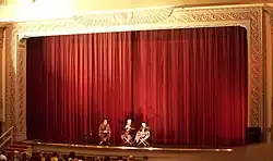 Main curtain used as a backdrop at a cinema