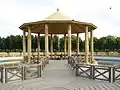 Structure and wooden bridge on the lake