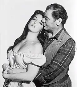 Black and white film still showing Katy Jurado with Ernest Borgnine