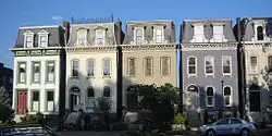 French style houses in a row face Lafayette Square Park