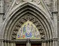 The mosaic above the portal