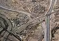 The new (in 2019) Border West Expressway single-point urban interchange – El Paso's first SPUI – is at Executive Center Blvd., which parallels San Marcos Drive of the La Calavera Historic Neighborhood of Smeltertown. The Smeltertown Cemetery is visible at the bottom by the expressway.
