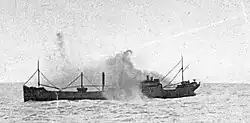 The cargo ship "Borgestad" being hit by Admiral Hipper