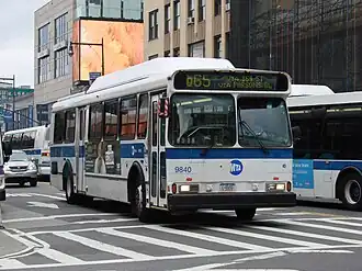 A Q65 bus in Downtown Flushing