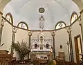 Main altar with fall decorations set up by the parishioners.