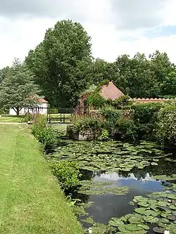 The Drawbridge and moat on the western side of the hall.