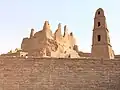 Omar ibn al-Khattab Mosque with its minaret and the castle in the background
