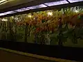 Tiled wall across from boarding platforms