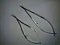 Upper right: Corneal spring scissors; Lower left: Vanna's scissors; for comparison